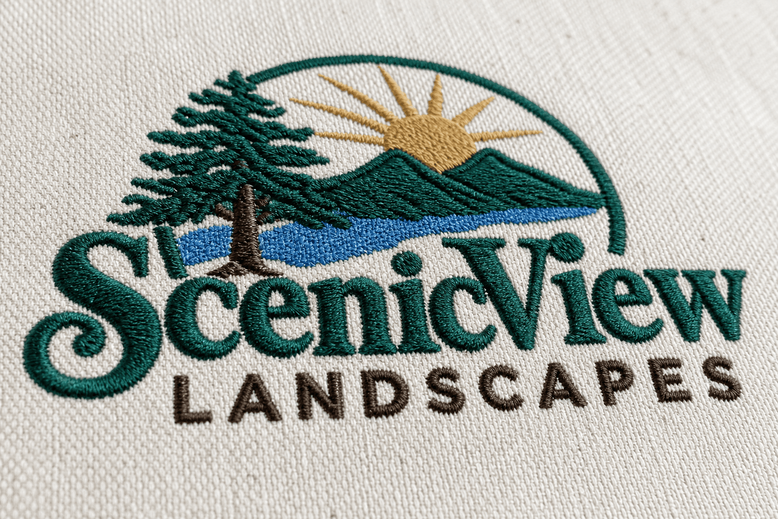 Close-up of a densely embroidered logo on canvas apron fabric