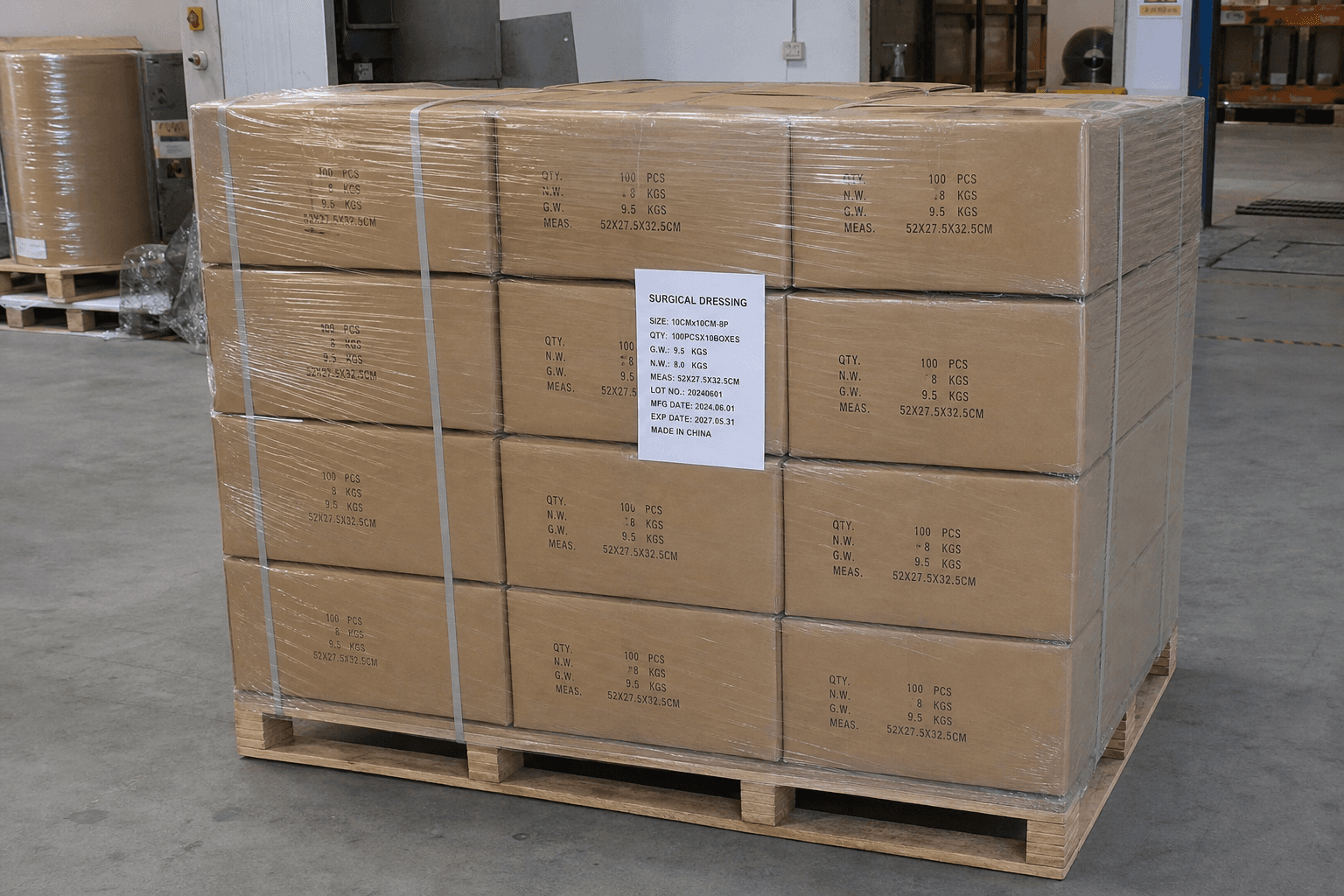 Cartons of finished aprons stacked on a pallet ready for export